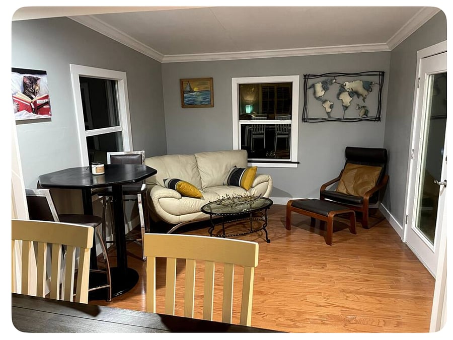added family room with french glass door and lots of light.. perfect room to read a book.