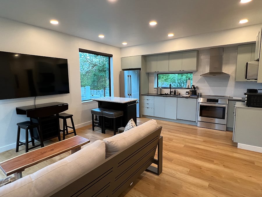 Kitchen, dining, living from entry