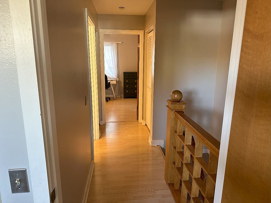 Hallway to bedrooms and bathroom