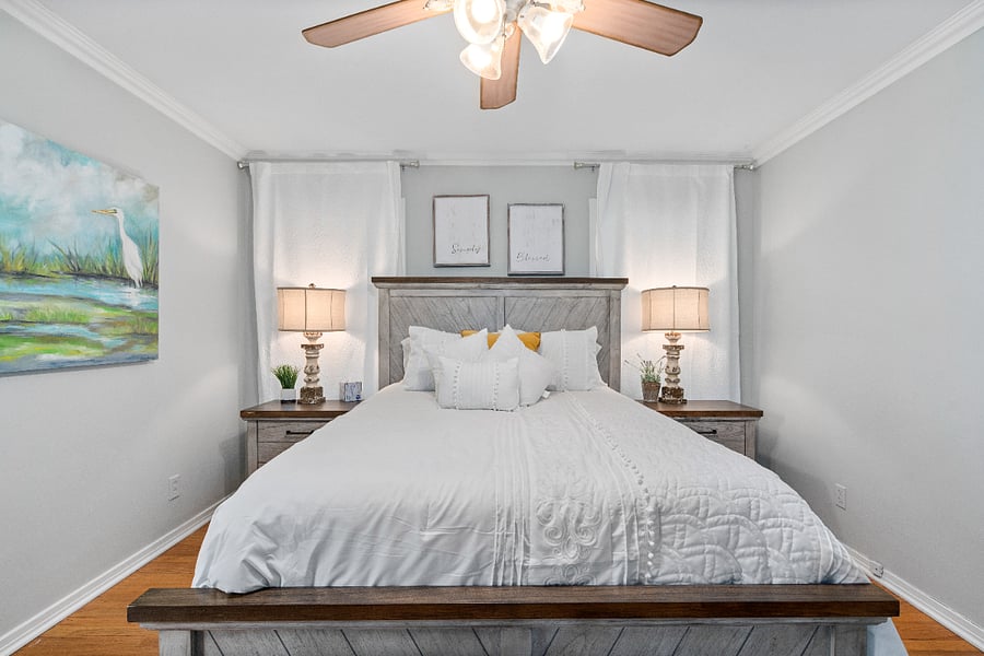 Bedroom with king sized bed. Smart TV. Closet and dresser storage.