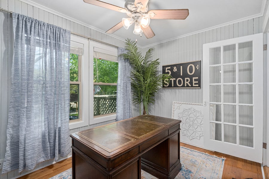 Additional room that is set up as an office. Wifi and smart TV are also located in this room. Desk with storage and bookcases.