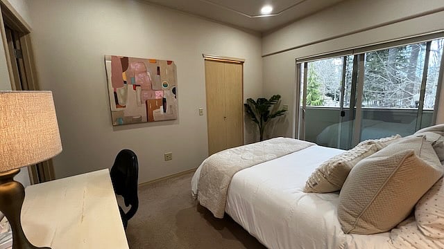 Bedroom 1.
With walk in closet, attached bath, queen bed, desk, and outside balcony.Bedroom 1.
With walk in closet, attached bath, queen bed, desk, and outside balcony.