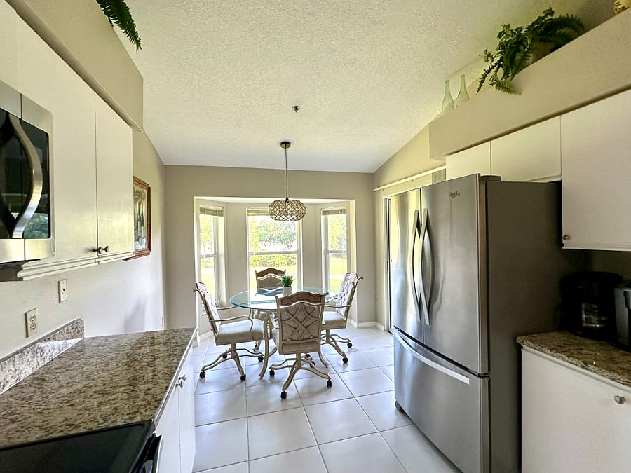 View of the Kitchen looking out on to the golf course. 