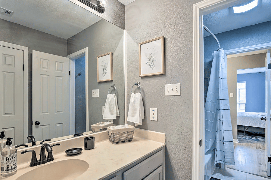 Each bedroom has a private sink, large mirror, hair dryer, towels, plenty of storage and a spacious walk-in closet, just for you! There is a jack and jill bathroom with a shower/tub and toilet.