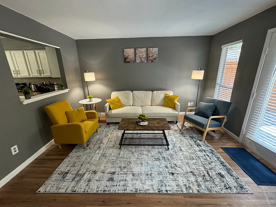 Sit back and relax in this cozy living room with comfortable seating, a Smart TV and high speed WiFi.