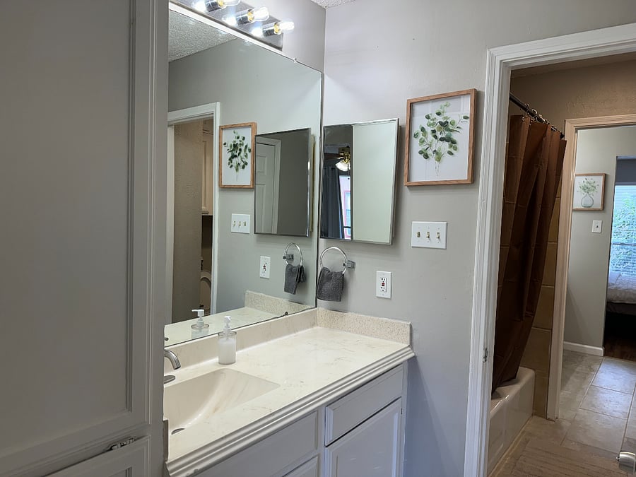 Each bedroom has a private sink, large mirror, towels, plenty of storage and a spacious walk-in closet, just for you! There is a jack and jill bathroom with a shower/tub and toilet.