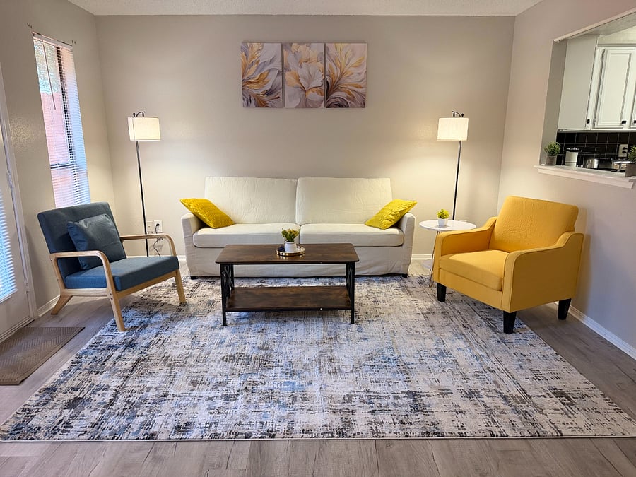 Sit back and relax in this cozy living room with comfortable seating, a Smart TV and high speed WiFi.