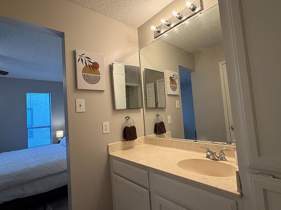 Each bedroom has a private sink, large mirror, towels, plenty of storage and a spacious walk-in closet, just for you! There is a jack and jill bathroom with a shower/tub and toilet.