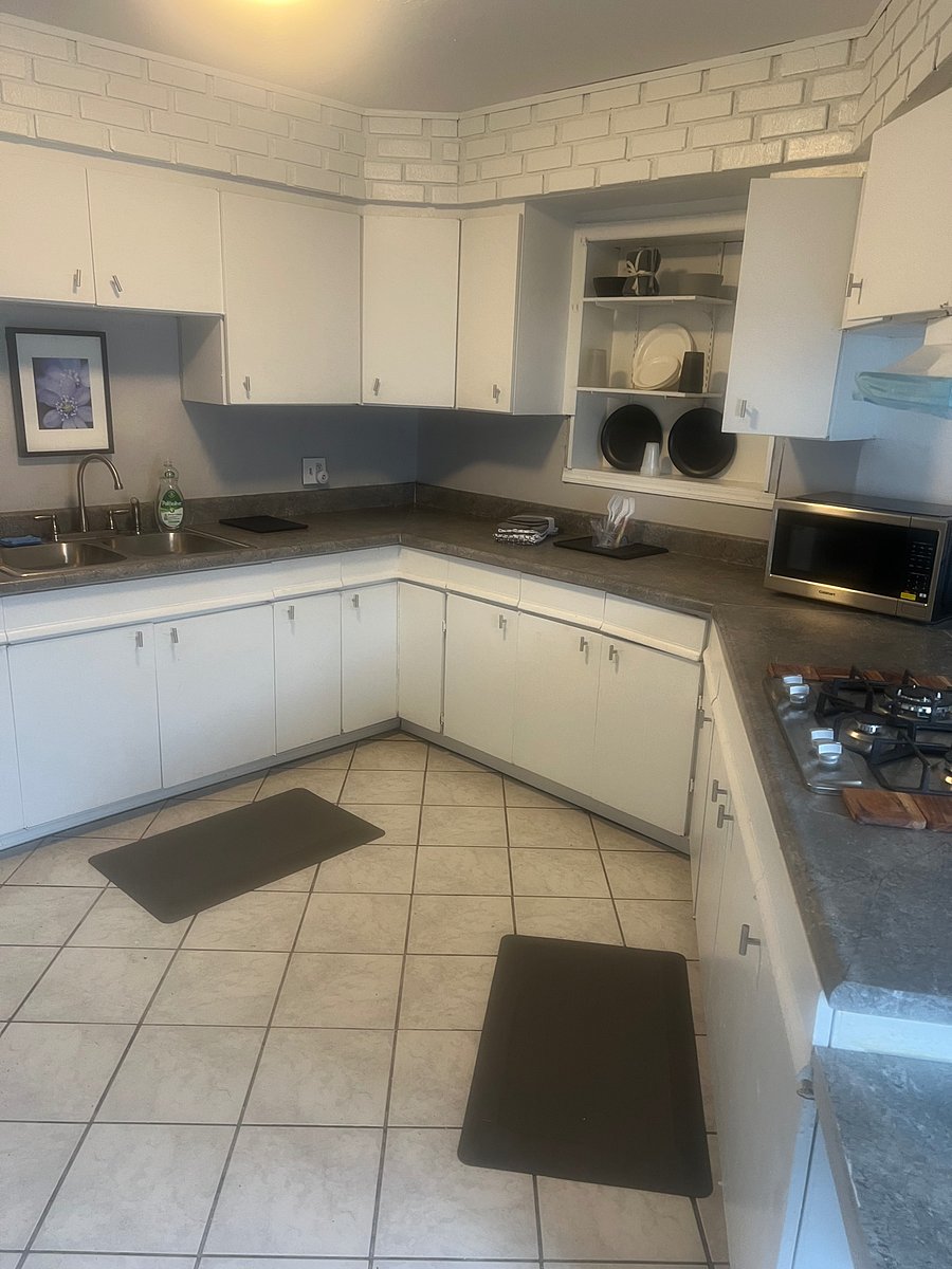 A huge beautiful remodel kitchen ,built in  oven new stove top and detached microwave.