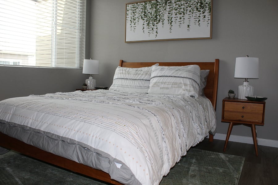 2nd Bedroom with Queen size bed, tall dresser in walk in closet with en suite bathroom