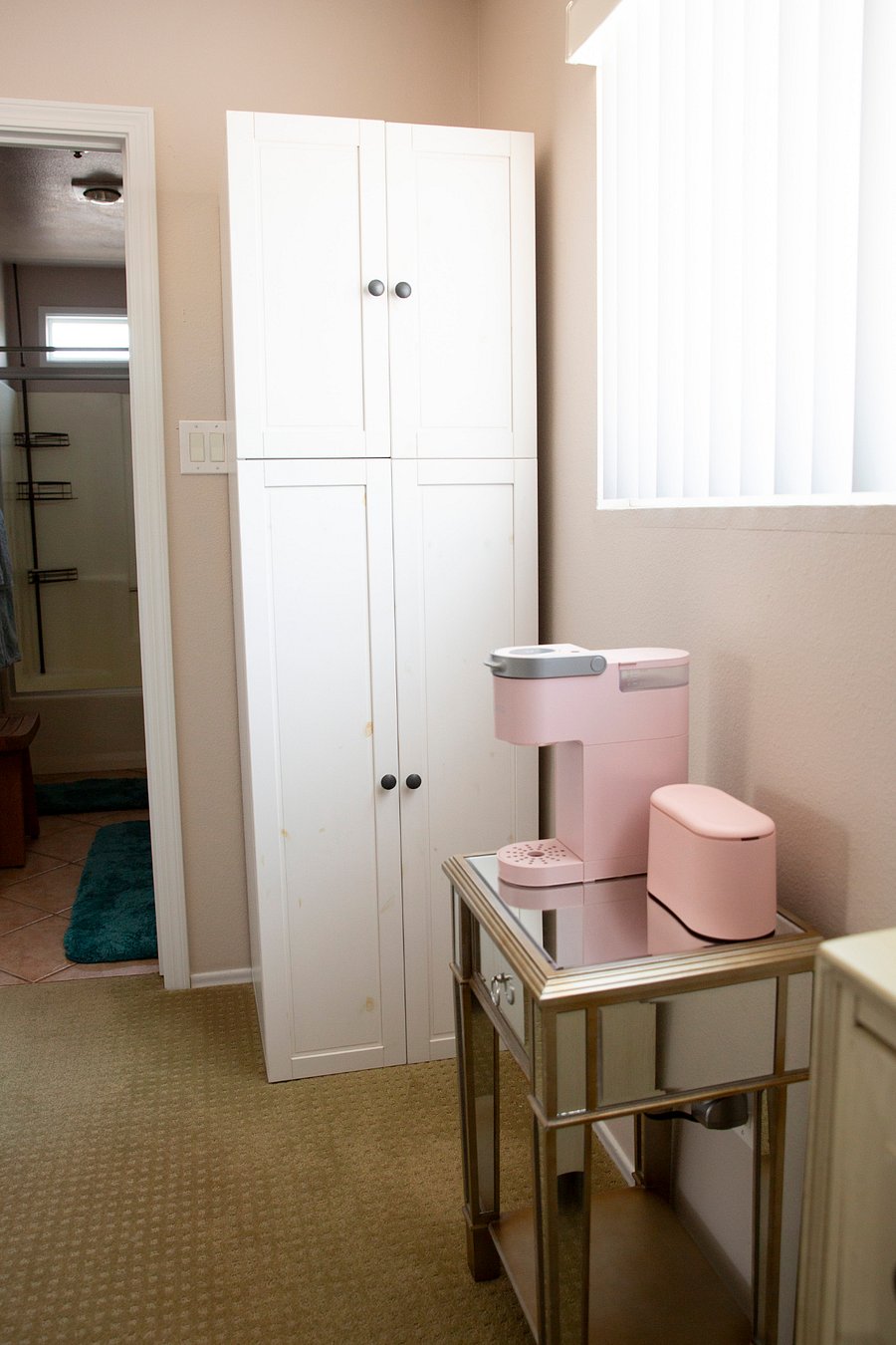 Private Linen Cabinet and Coffee Area in Upstairs Landing Space