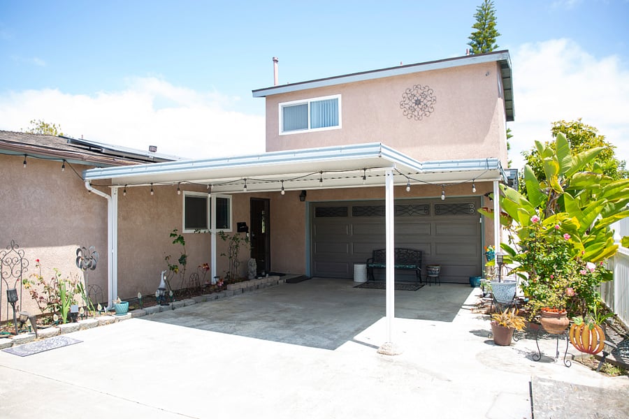 Front of House with Driveway Parking Space on Right Side