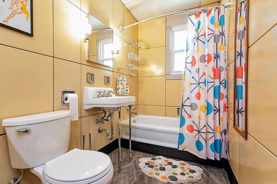Even the bathroom still has its original features such as an extra-large tub