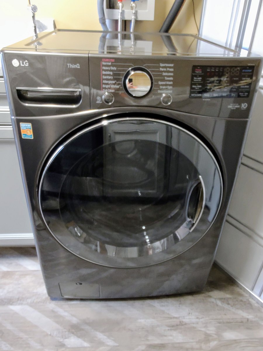 LG ThinQ combo washer/dryer. Start a load of clothes and when you come back they are fully washed and dried. All in one easy step!!