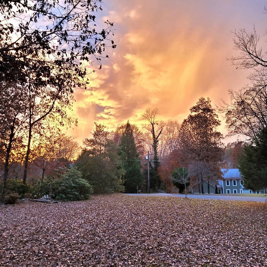 View from the front porch of the house at sunset