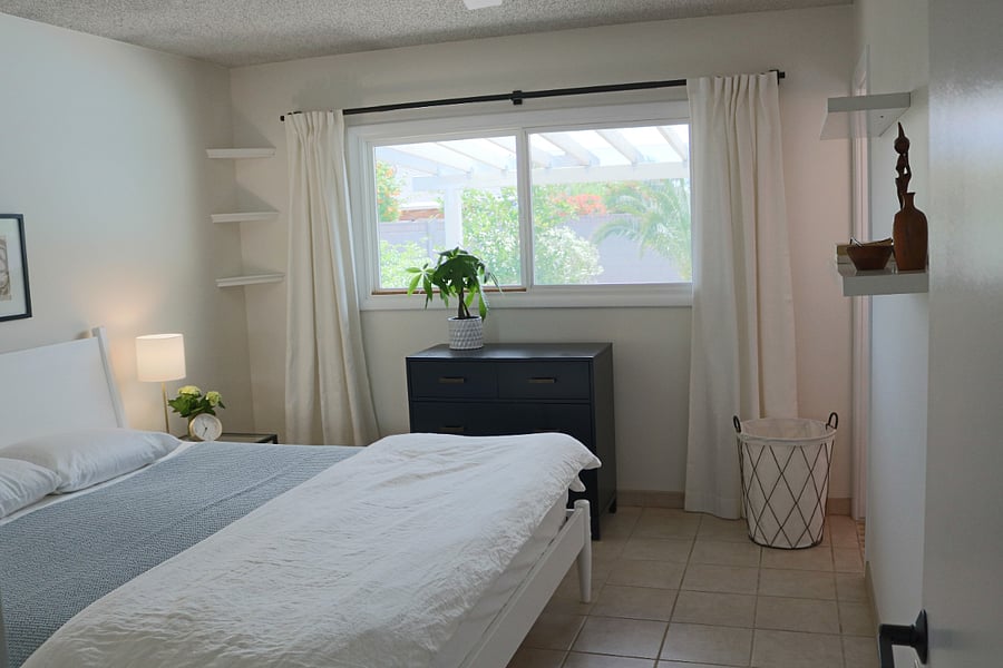 primary bedroom with view to backyard