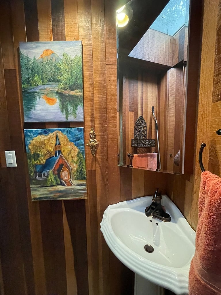 bathroom beyong shower on the other side of the kitchen
with 2 pocket doors for privacy