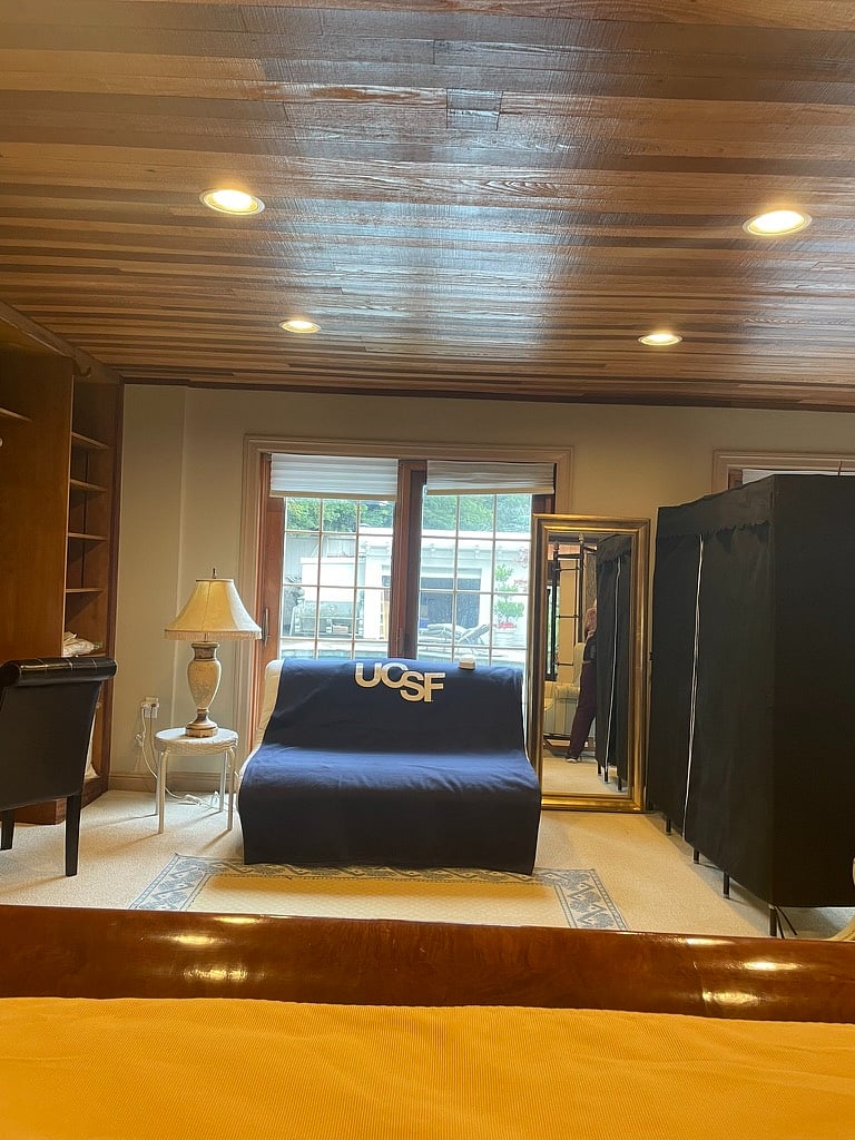 plenty room for shoes and clothes in storage to the right in the dressing area