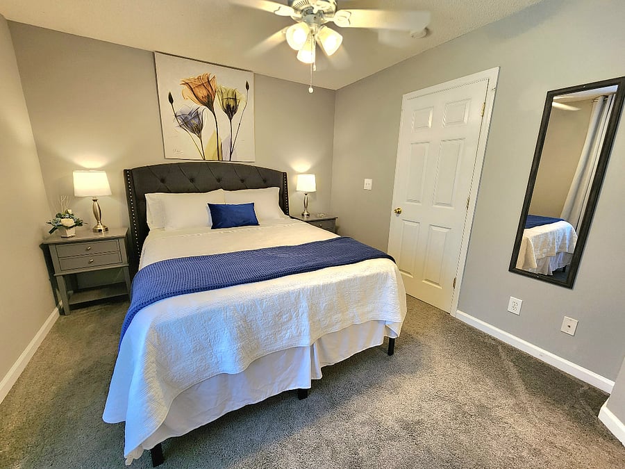Queen Bed in Room 1 w/ USB ports in bedside lights