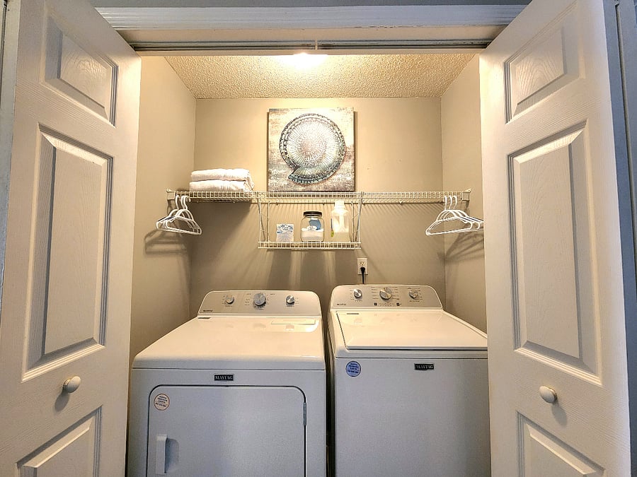 Washer and Dryer between bedrooms located in the hall upstairs