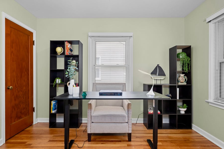 The office has a powered adjustable desk allowing the option for sitting or standing comfortably during zoom calls or other work using the fast WiFi. For privacy, the French doors can be closed or remain open for interacting with guests or viewing the television.