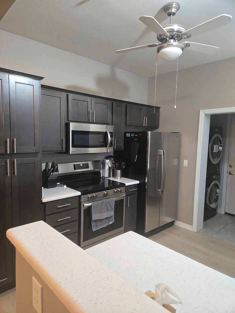 New kitchen cabinets with upgraded stove and Bosch dishwasher.
