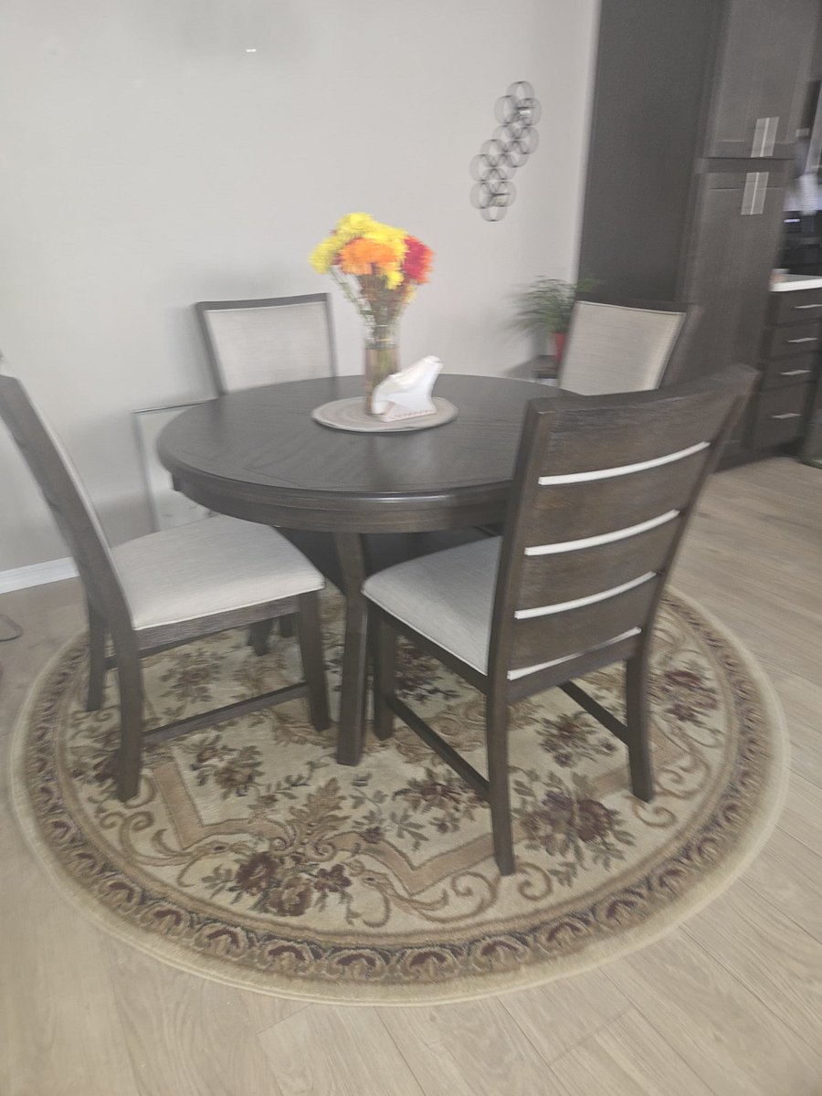 Brand new dining table and chairs.