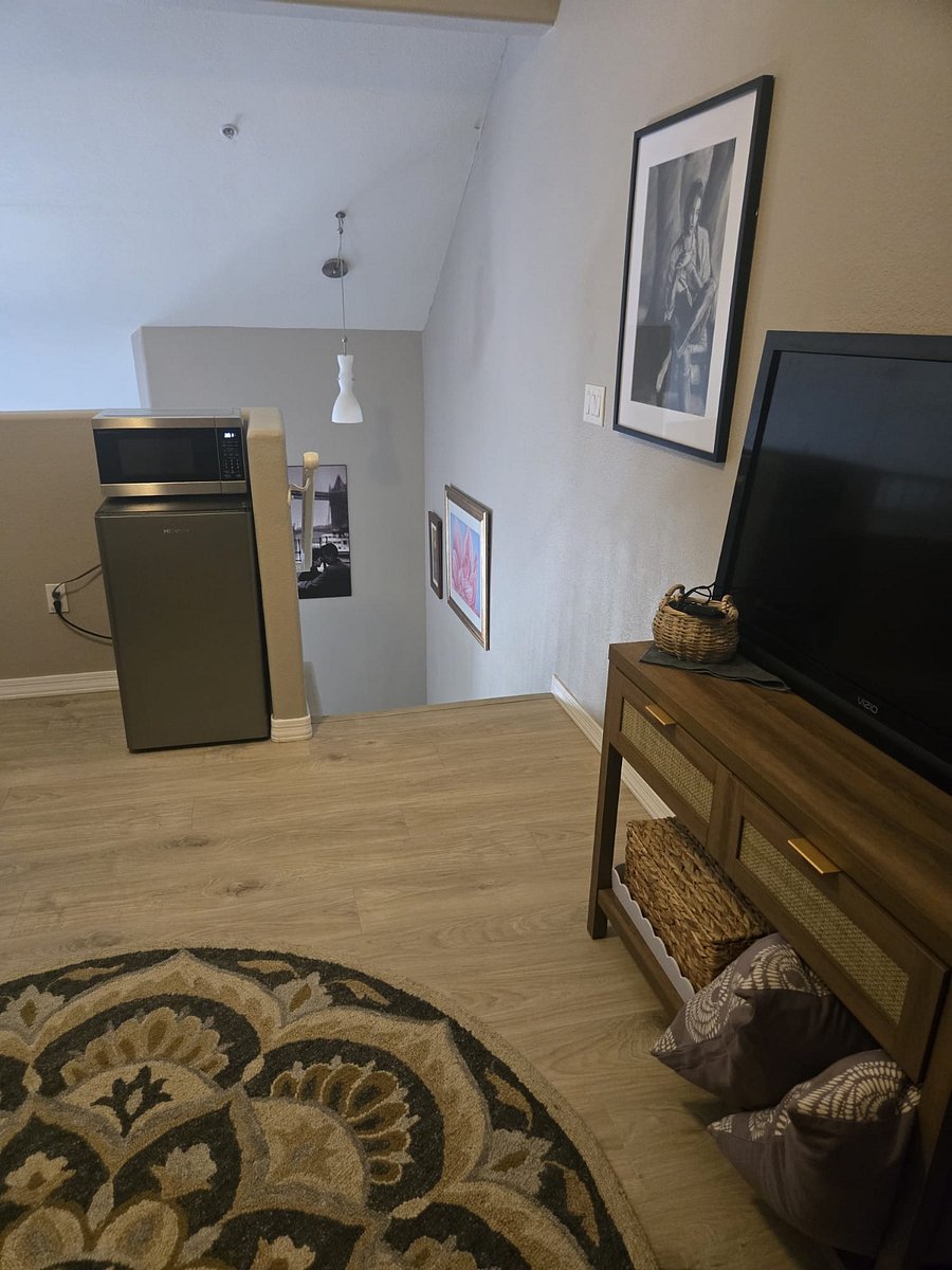 Mid size Fridge and microwave in tv loft upstairs