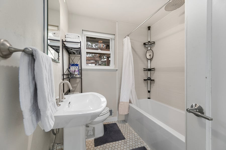 Bath with rain shower and tub
