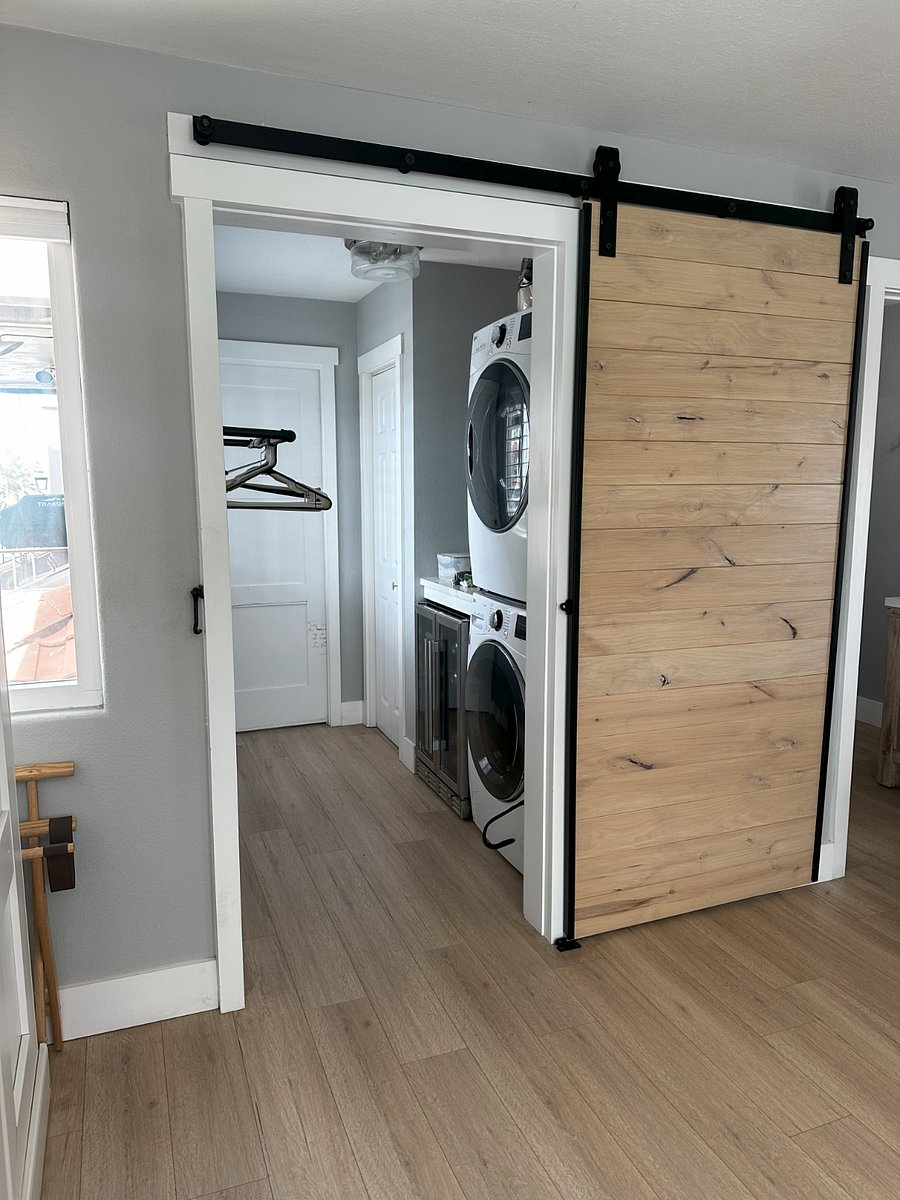 Entrance to Laundry Room from Bonus Room. Full size washer and dryer and wine fridge.