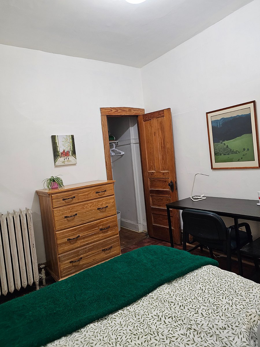 Desk with chair and lamp, adequate size closet