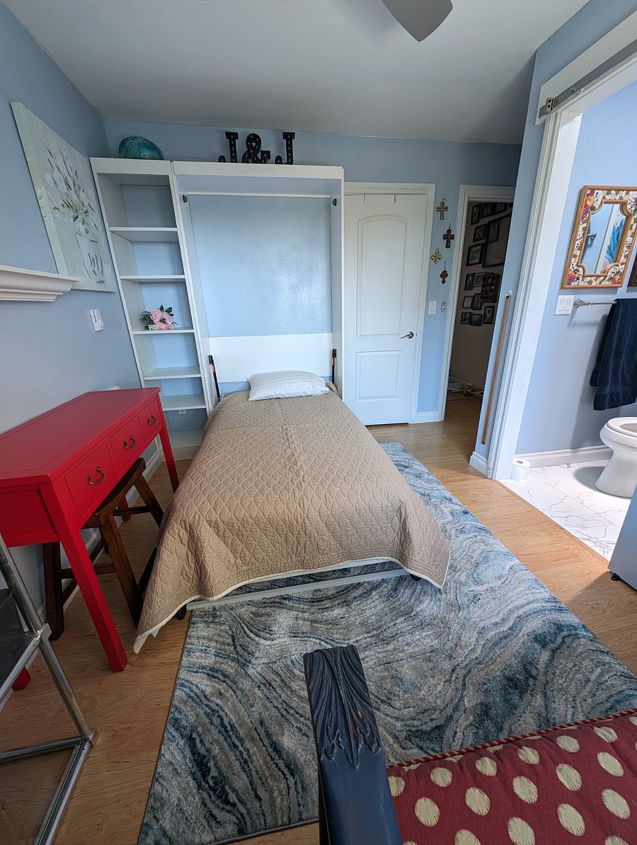 Bed is very easy to pull down and return to cabinet