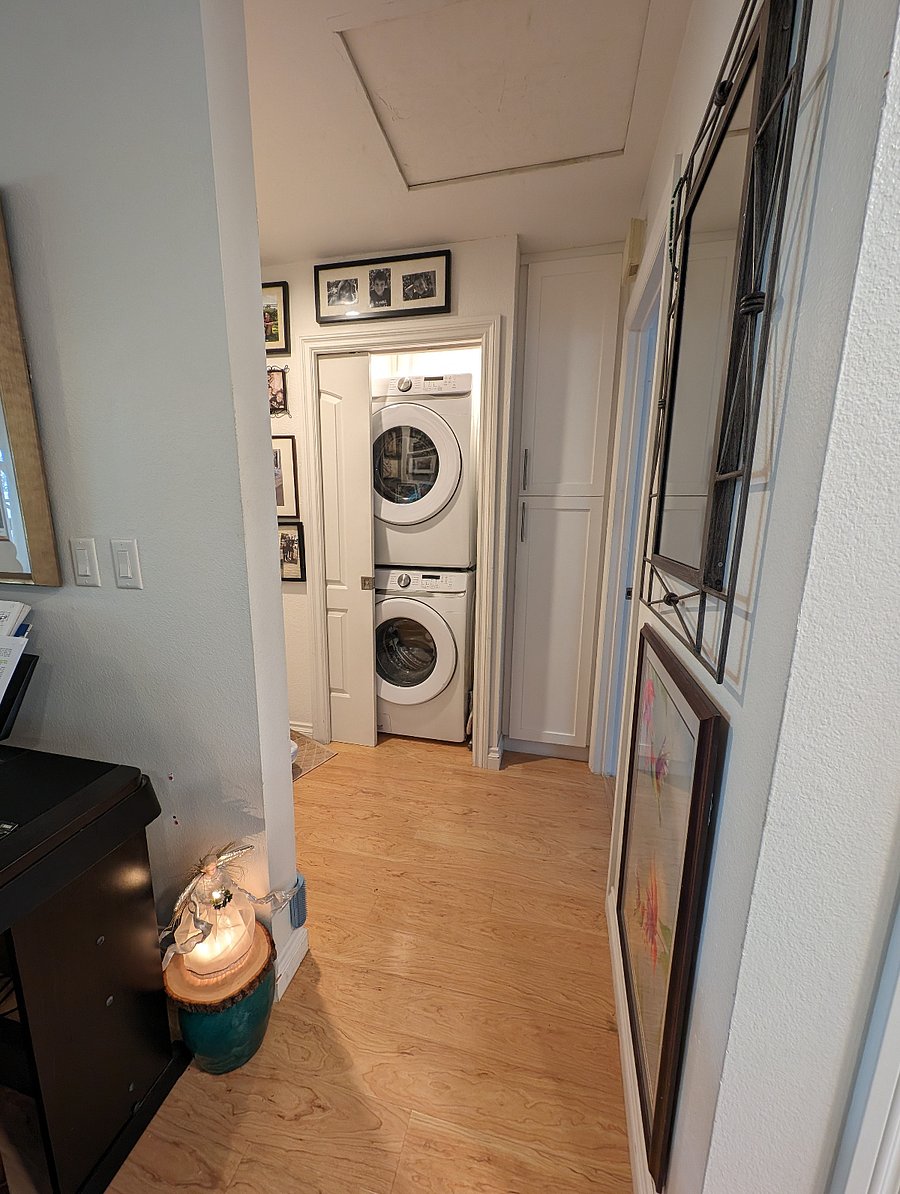 Washer / dryer in condo hallway