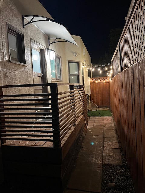 Back patio with BBQ grill, private fully enclosed space.