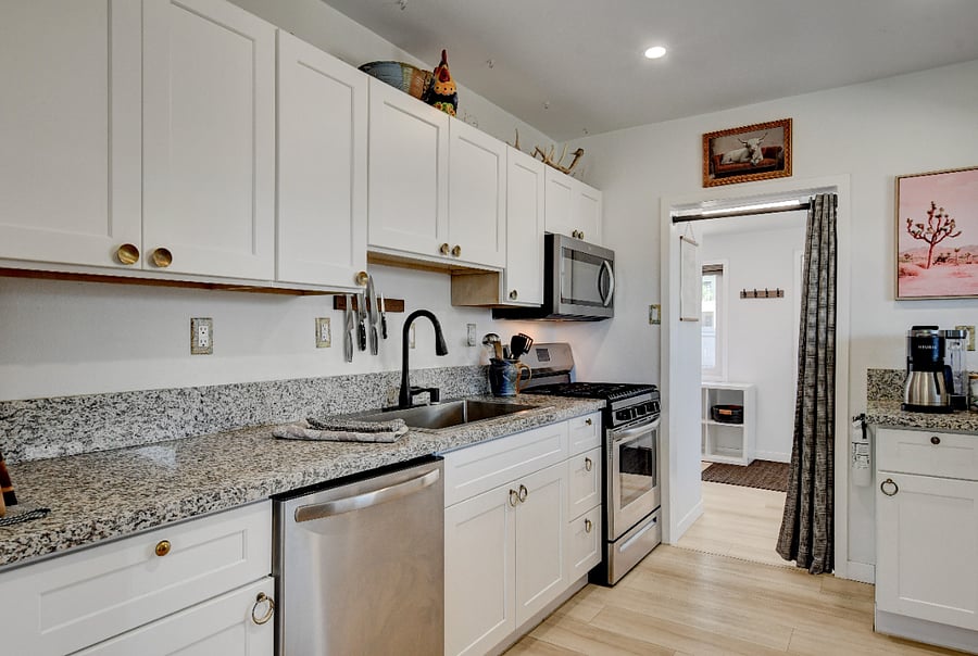 Main Home's galley kitchen is well stocked