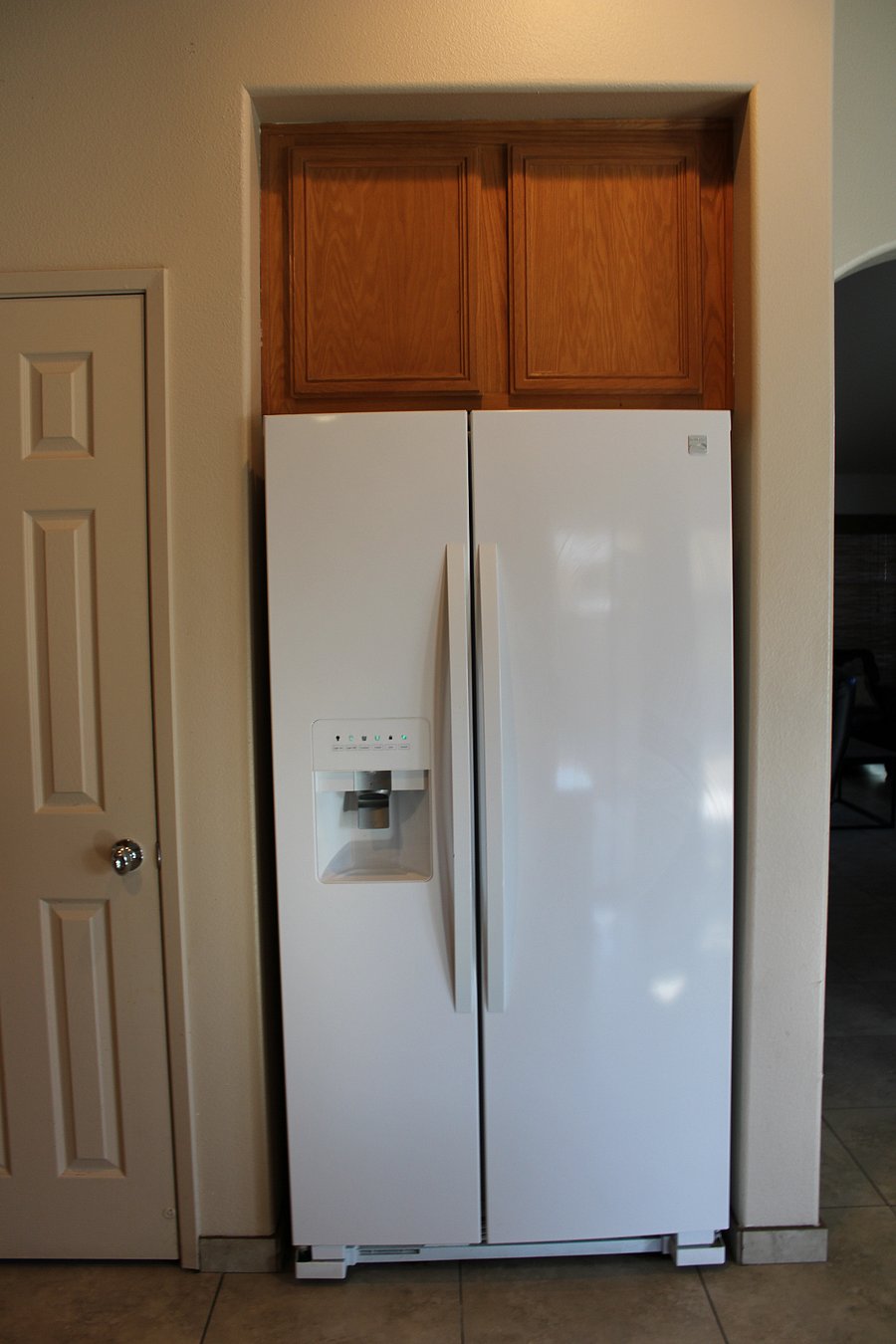 Refrigerator with filtered water and ice maker.