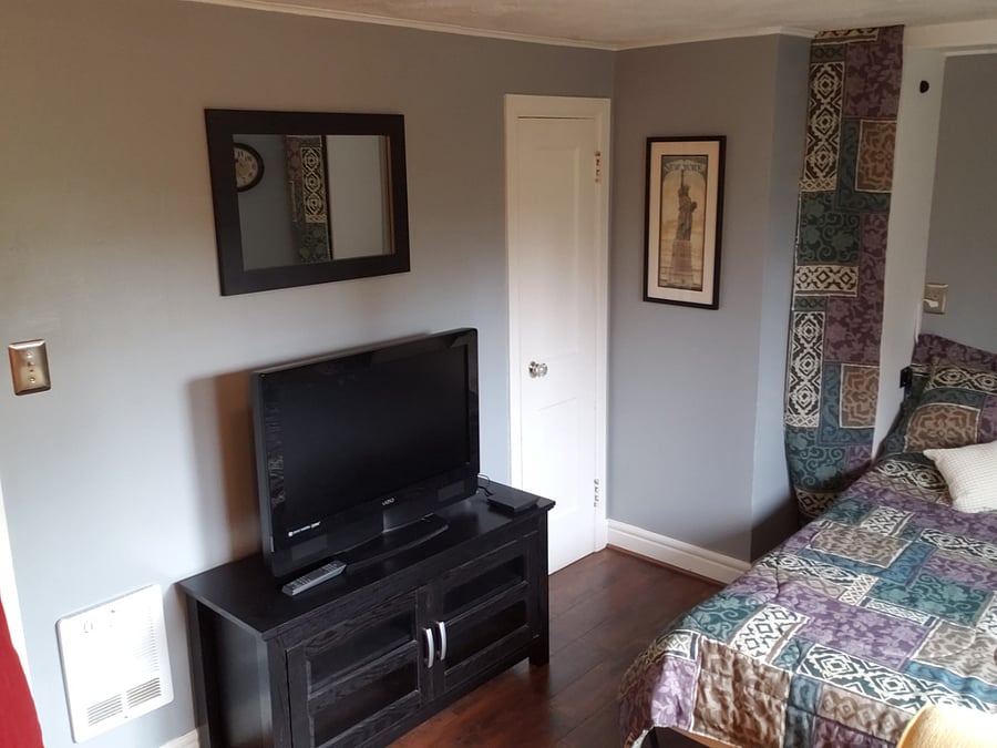 Main living area with smart TV, Dish service