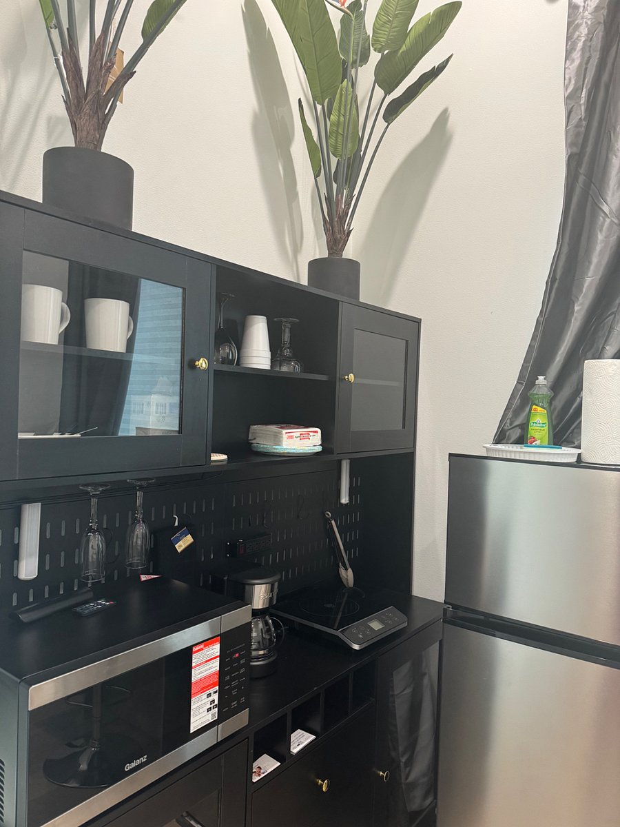 Private unit kitchenette includes pots, plates, cups and utensils. The microwave is also an oven and air fryer, the coffee pot can also sift for tea lovers.
