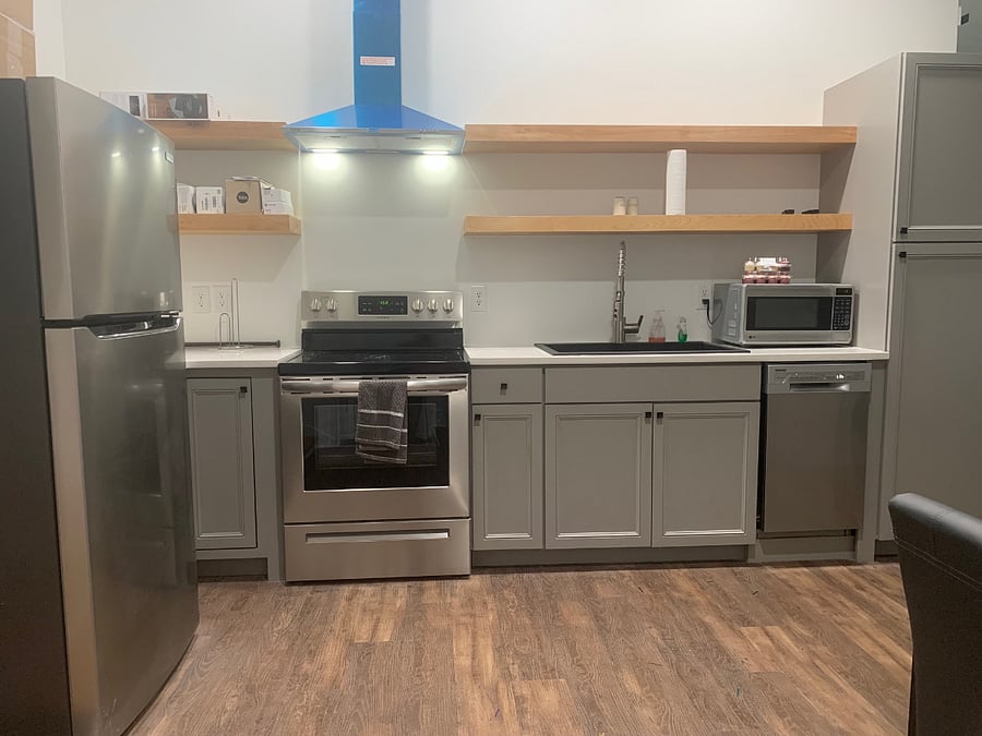 Kitchen area with full size appliances. Has a dishwasher and microwave for your convienence. 