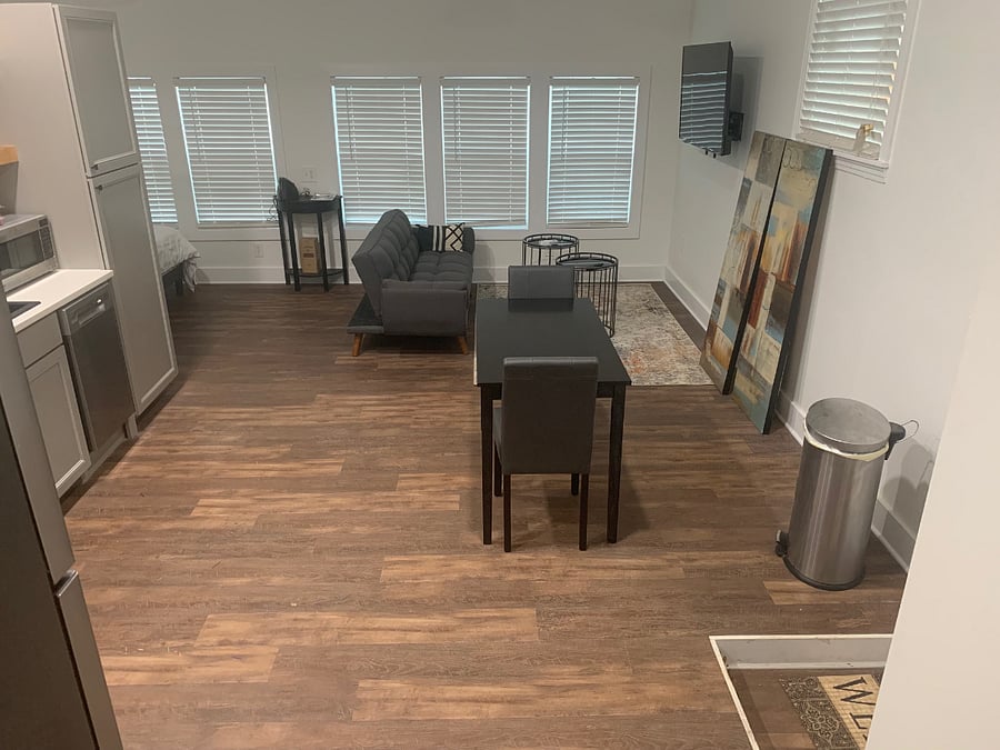 Open floor plan studio. View of dining area and living area.