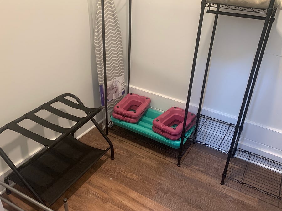 Luggage rack for suitcases. Ironing board and iron provided. (Exercise stairs not included).
