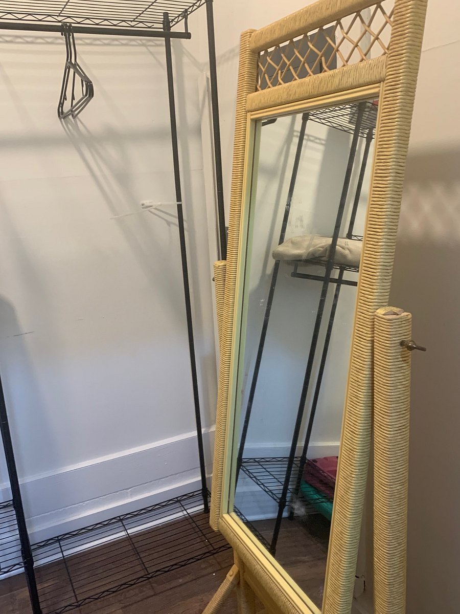 Closet area with storage, shelving and mirror. Extra blanket provided in closet.