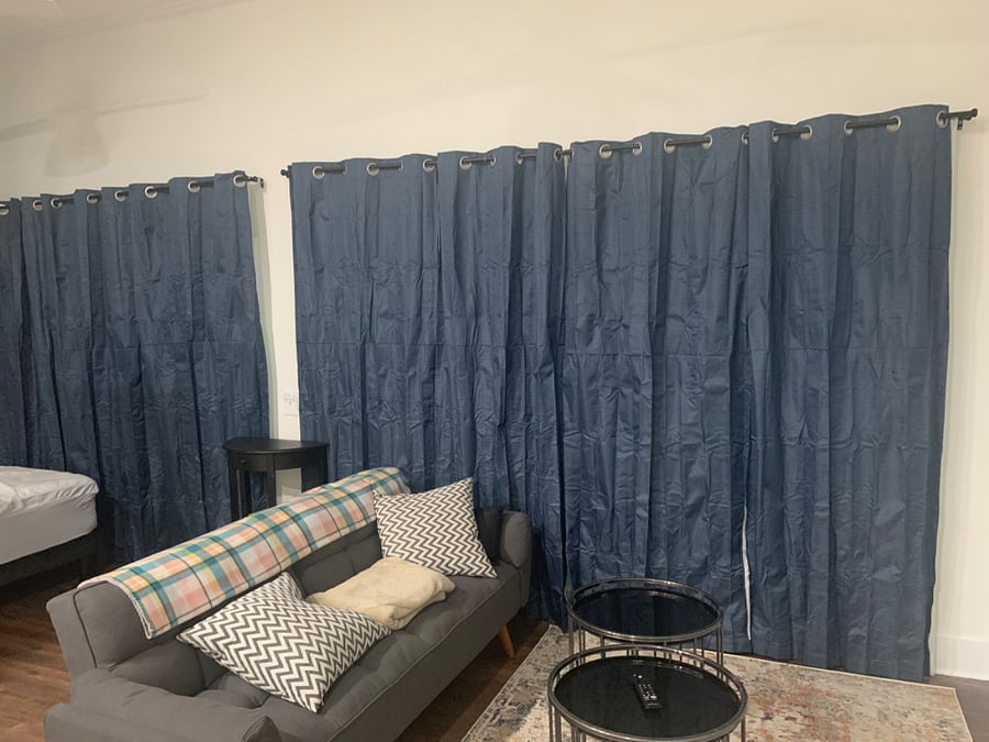Room with darkening shades.