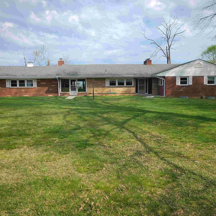Front side of house with entrance doors