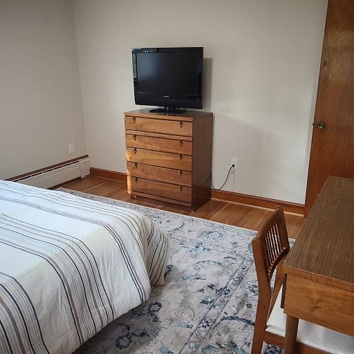 Bedroom #2 with dresser/smart TV