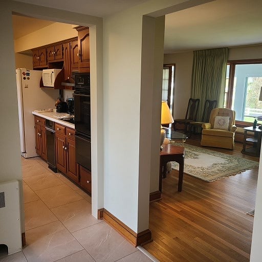 Hallway split, left kitchen, right living room