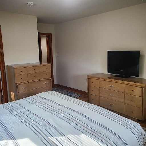 Master bedroom towards door/smart TV
