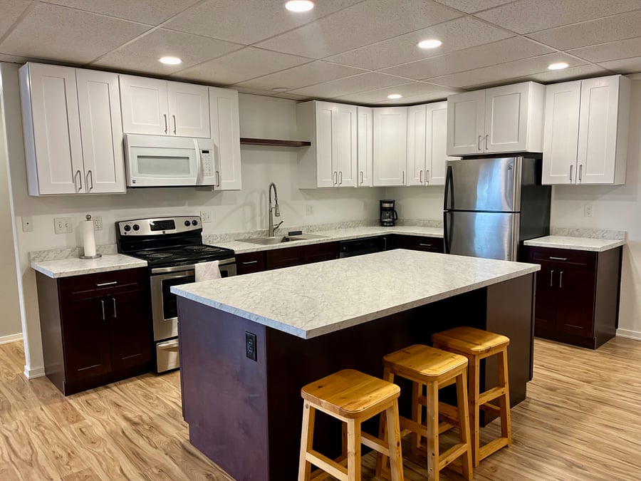 Brand new, remodeled kitchen with a full sized refrigerator, dishwasher, stove and oven, furnished with all the essential kitchen use items: silverware, plates, bowls, glasses, cooking utensils, pyrex tupper-ware, glass casserole dishes, crockpot, toaster, coffee maker, pots and pans, pie pans and bread loaf pans, beer and wine glasses, dish towels, ice cube trays, dish drying pad, hot pads, and more!