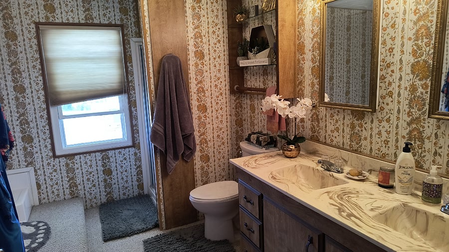 Master bath with shower and large tub