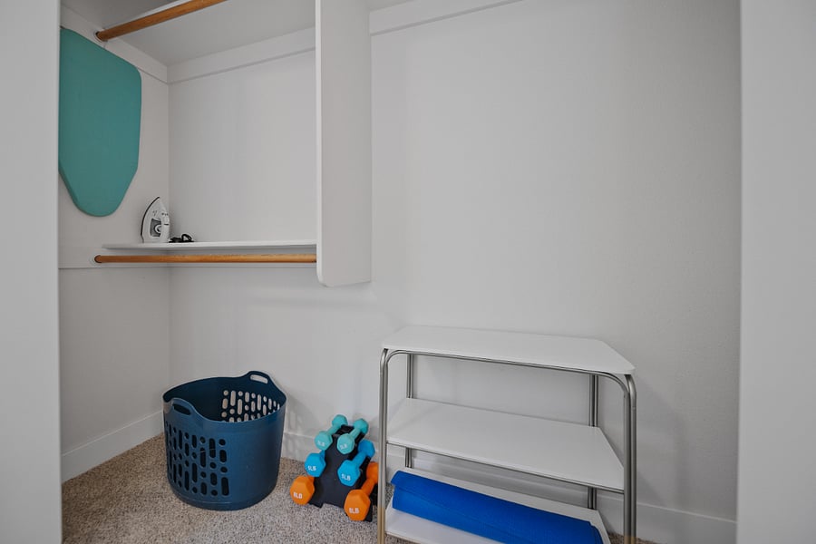 Closet Interior  with Shoe Shelves + Weights and Yoga Mat.